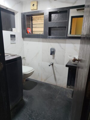 Bathroom in 2 BHK Apartment at Evershine Park, Andheri West – for Rent