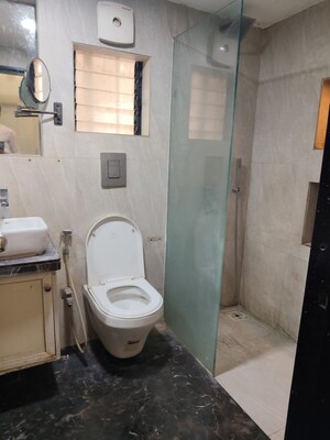 Bathroom in 2 BHK Apartment at Evershine Park, Andheri West – for Rent