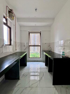 Kitchen in 1 BHK Apartment at Raymond Ten X Habitat, Pokhran Road No Two – for Rent