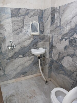 Bathroom in 4 BHK Builder Floor at Vasundhara Sector 5 – for Rent