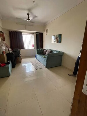 Living Room in 1 BHK Apartment at Bhoomi Park, Malad West – for Rent