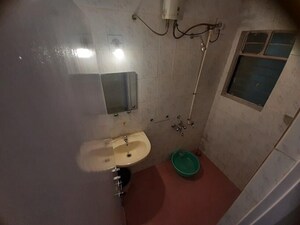 Bathroom in 2 BHK Apartment at Mahatma Society – for Rent