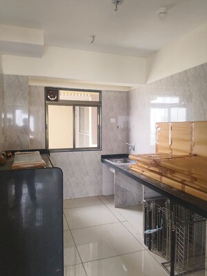Kitchen in 2 BHK Apartment at Group Satellite Elegance, Goregaon East – for Rent
