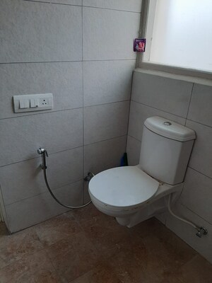 Bathroom in 1 RK Apartment at Malwa Escon Primera, International Airport Road – for Rent