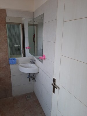 Bathroom in 1 RK Apartment at Malwa Escon Primera, International Airport Road – for Rent