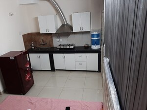 Kitchen in 1 RK Apartment at Malwa Escon Primera, International Airport Road – for Rent