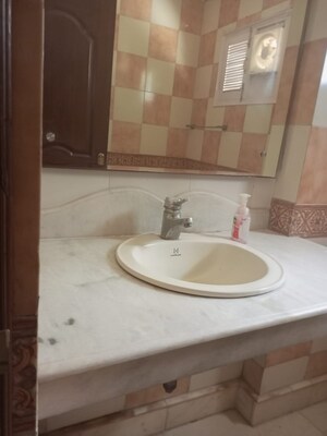 Bathroom in 3 BHK Builder Floor at Defence Colony – for Rent