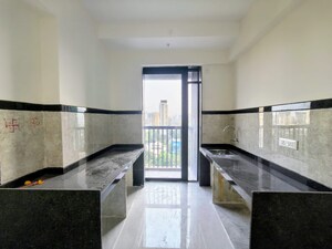 Kitchen in 2 BHK Apartment at Damji Shamji Mahavir Spring Tulip Phase 1, Pokhran Road No Two – for Rent