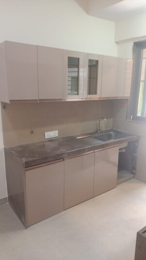 Kitchen in 2.5 BHK Apartment at Bhimjyani Verraton, Manpada – for Rent