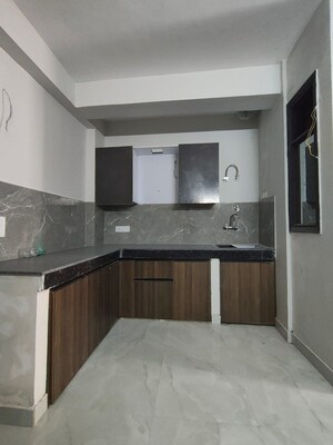 Kitchen in 2 BHK Builder Floor at Freedom Fighters Enclave – for Rent