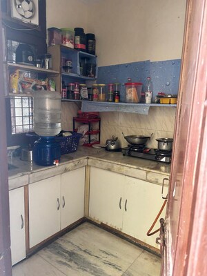 Kitchen in 2 BHK Apartment at RWA Apartments, Sector 31 – for Rent