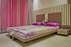 Bedroom in 4 BHK Apartment at Vesu – for Rent