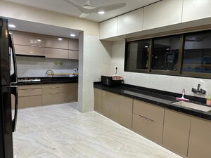 Kitchen in 4 BHK Apartment at Piplod – for Rent