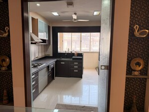 Kitchen in 4 BHK Apartment at Piplod – for Rent