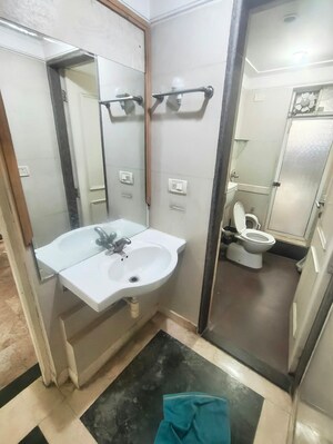 Bathroom in 1 BHK Apartment at Hiranandani Meadows, Manpada – for Rent