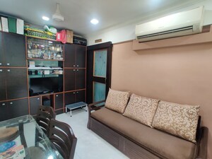 Living Room in 1 BHK Apartment at Jumbo Darshan, Andheri East – for Sale