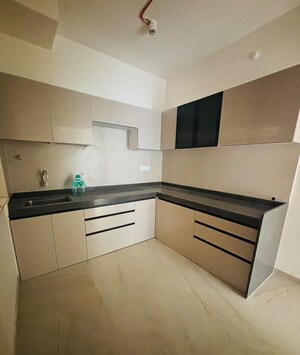 Kitchen in 2 BHK Apartment at Dosti West County Phase 4 Dosti Pine, Balkum Pada – for Rent