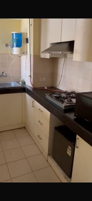 Kitchen in 1 BHK Apartment at Paras Seasons, Sector 168 – for Rent
