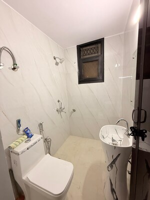 Bathroom in 3 BHK Builder Floor at Freedom Fighters Enclave – for Rent