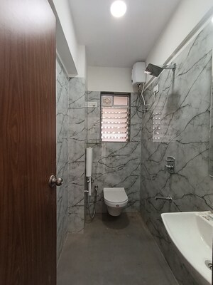 Bathroom in 1 BHK Apartment at Neelam CHS Dahisar, Dahisar West – for Rent