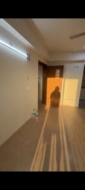 Building Lobby in 2 BHK Apartment at Godrej Woods, Sector 43 – for Rent
