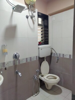 Bathroom in 2 BHK Apartment at Lokhandwala Highland, Kandivali East – for Rent