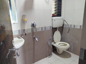 Bathroom in 2 BHK Apartment at Lokhandwala Highland, Kandivali East – for Rent