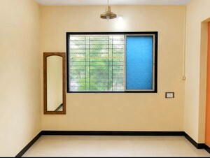 Room in 1 BHK Apartment at Veena Nagar CHS, Mulund West – for Rent