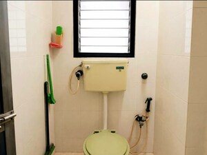 Bathroom in 1 BHK Apartment at Veena Nagar CHS, Mulund West – for Rent