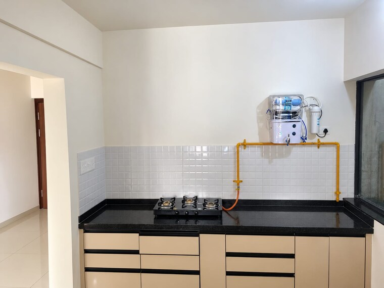 Kitchen, shapoorji-pallonji-vahana-yahavi-phase-1 3 Bedroom 1011 Sq.Ft. Apartment In Bavdhan Pune 10778252