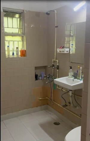 Bathroom in 2 BHK Apartment at Vasant Kunj Enclave – for Rent