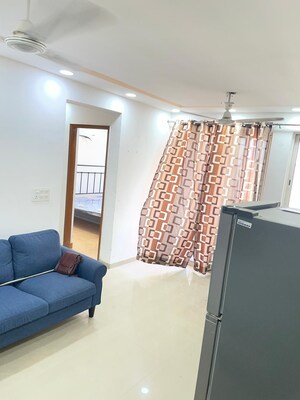 Living Room in 2 BHK Apartment at Jaypee Green Kosmos Phase II, Sector 134 – for Rent