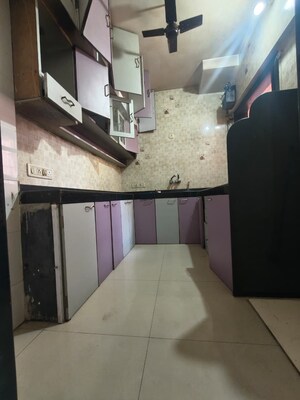Kitchen in 2 BHK Apartment at Moreshwar CHS, Kalwa – for Rent
