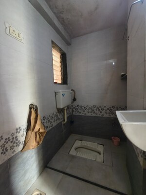 Bathroom in 2 BHK Apartment at Moreshwar CHS, Kalwa – for Rent