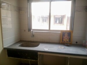 Kitchen in  Apartment at Gothivali Village – for Sale