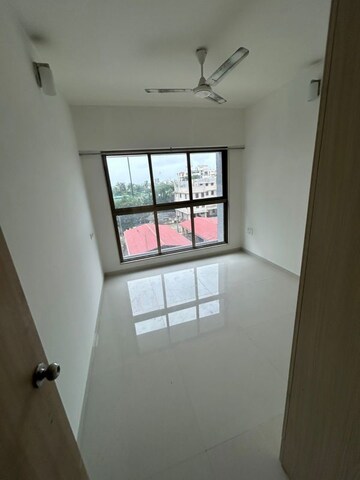 Living Room in 2 BHK Apartment at Rajesh Raj Infinia, Malad West – for Rent