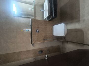 Bathroom in 2 BHK Apartment at Puravankara Silversands, Mundhwa – for Rent