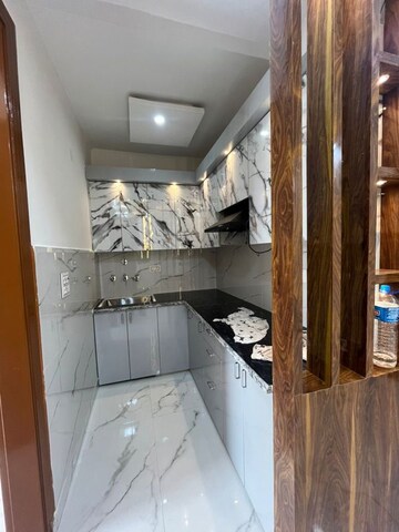 Kitchen in 2 BHK Builder Floor at Dwarka Mor – for Rent