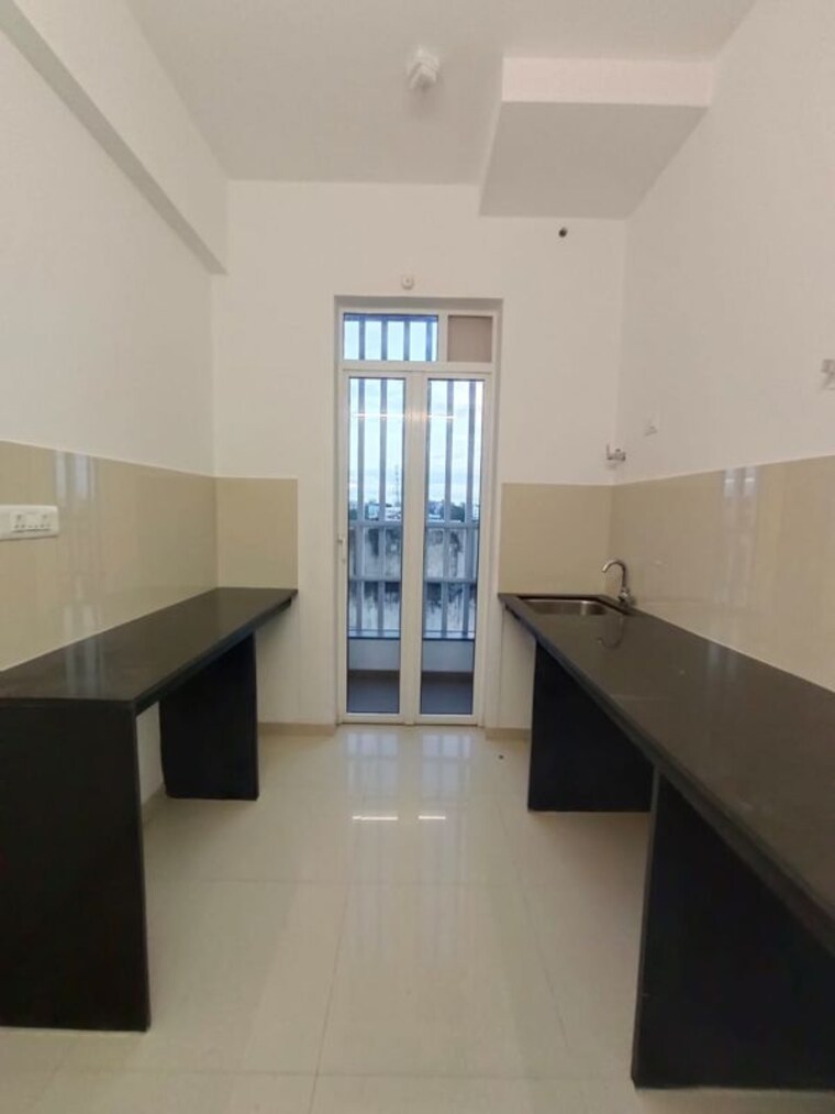 Kitchen, runwal-the-central-park 2 Bedroom 666 Sq.Ft. Apartment In Chinchwad Pune 9674492