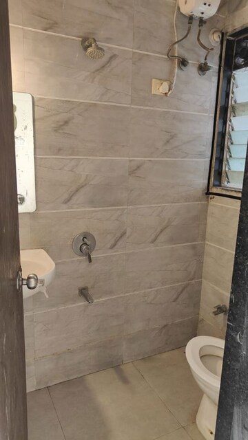 Bathroom in 2 BHK Apartment at Marvel Shanti Heights, Kopar Khairane – for Sale
