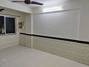 Kitchen in 1 BHK Apartment at Kirtikar CHS, Ganeshwadi – for Sale