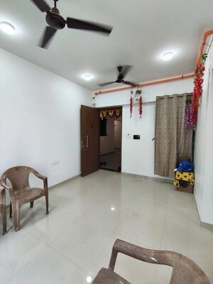 Living Room in 2 BHK Apartment at Kalpataru Immensa, Kolshet Road – for Rent