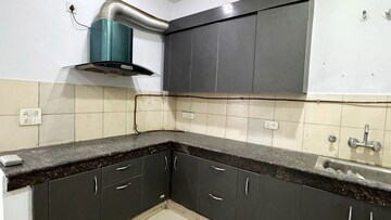 Kitchen in 2 BHK Apartment at Gulshan Bellina, Sector 16 Greater Noida – for Rent
