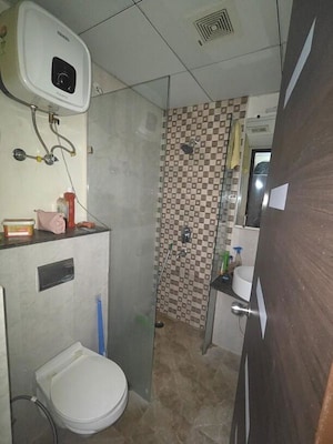 Bathroom in 3 BHK Apartment at Gaur Saundaryam, Tech Zone 4 Greater Noida – for Rent