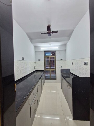 Kitchen in 1 BHK Apartment at Shiv Shakti Tower 28, Malad East – for Sale