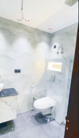 Bathroom in 3 BHK Apartment at Rohini Sector 9 – for Sale