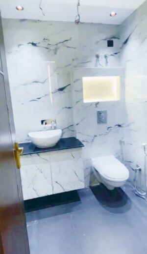 Bathroom in 3 BHK Apartment at Rohini Sector 9 – for Sale