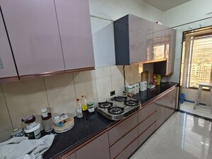 Kitchen in 2 BHK Apartment at Evershine Greens, Andheri West – for Sale