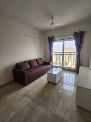 Living Room in 2 BHK Apartment at Shapoorji Pallonji BKC 28, Bandra East – for Rent