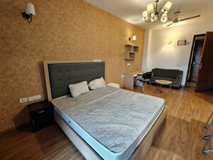 Bedroom in 1 BHK Apartment at Nimbus The Golden Palm, Sector 168 – for Rent